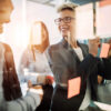 business team meeting, blonde woman laughing