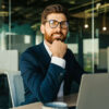 Man at his laptop in the office